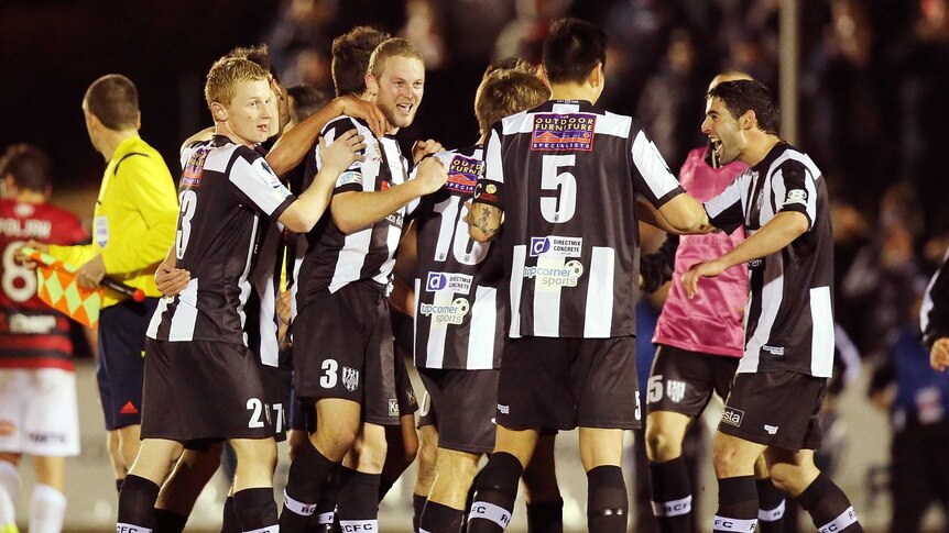 Adelaide City celebrate their win over the Wanderers