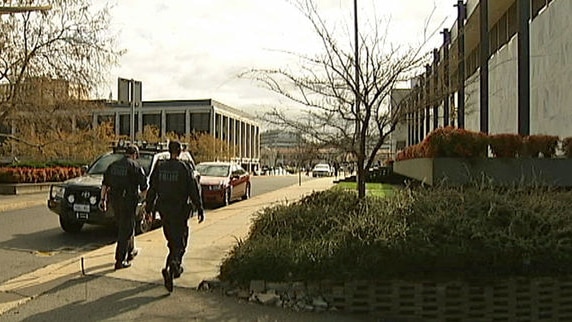 Security boost: police patrol the ACT Supreme Court during the murder trial of Russel Field.