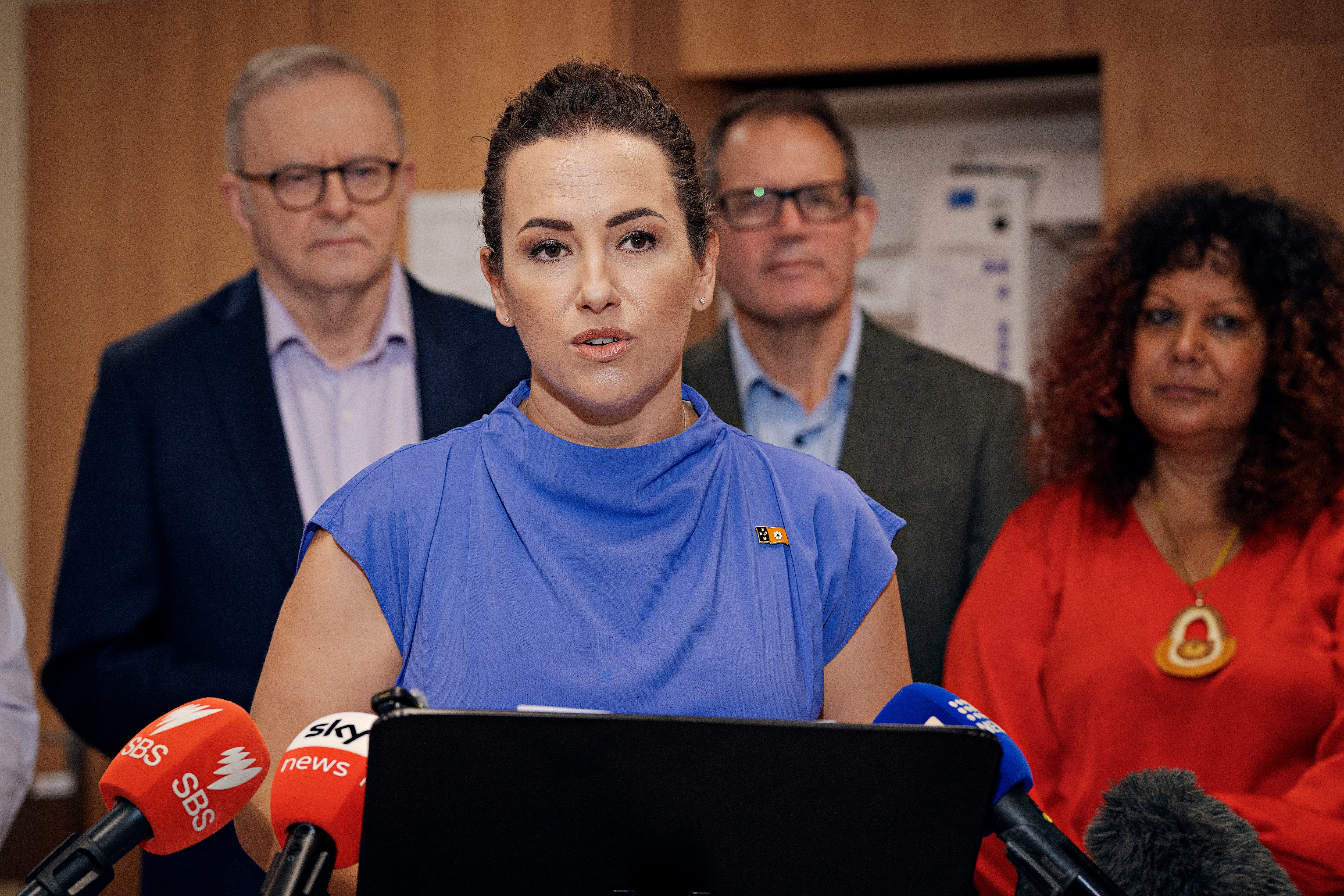 Lia Finocchiaro speaking at a press conference .