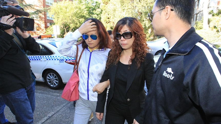 The family of Michelle Leng, including a woman believed to be her mother arrive at court.