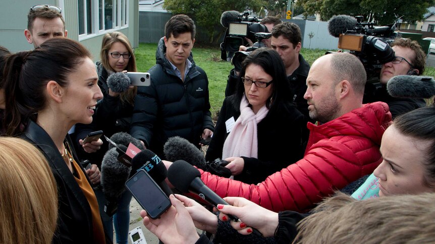 Jacinda Ardern makes an announcement outside a school in Christchurch.