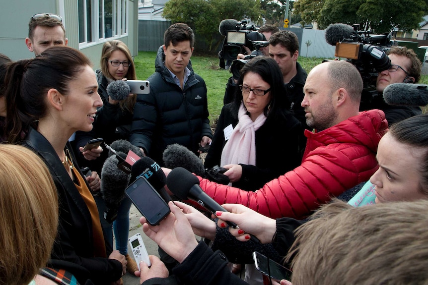 Jacinda Ardern makes an announcement outside a school in Christchurch.