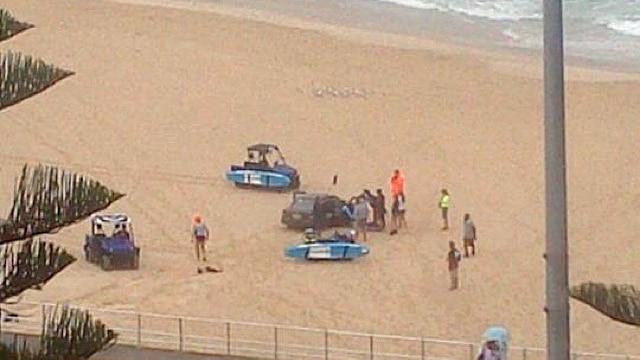 Car on sand at Bondi Beach