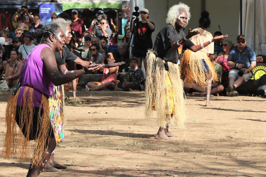 Three Aboriginal women dancing, Aunty Martha Koowarta on the far right