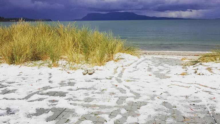 Mel Sullivan's photo of hail at Raspins Beach, Tasmania.