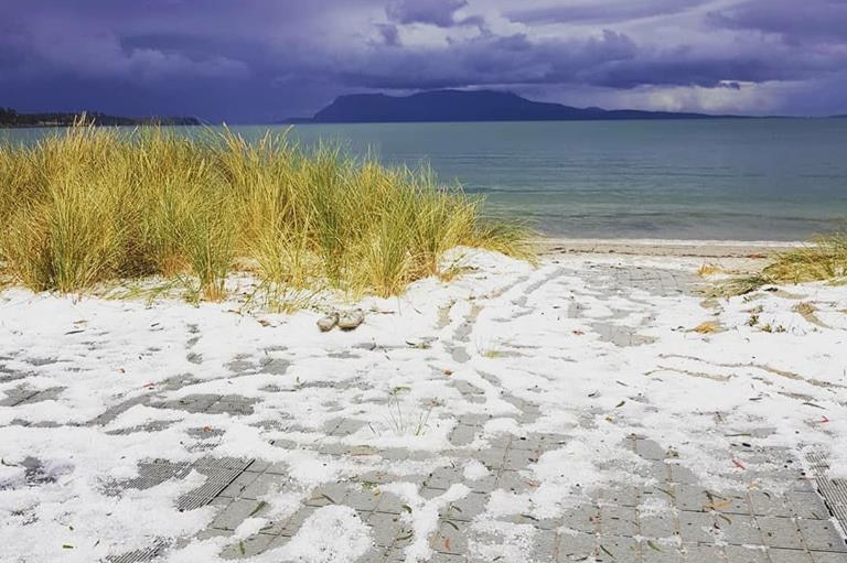 Mel Sullivan's photo of hail at Raspins Beach, Tasmania.