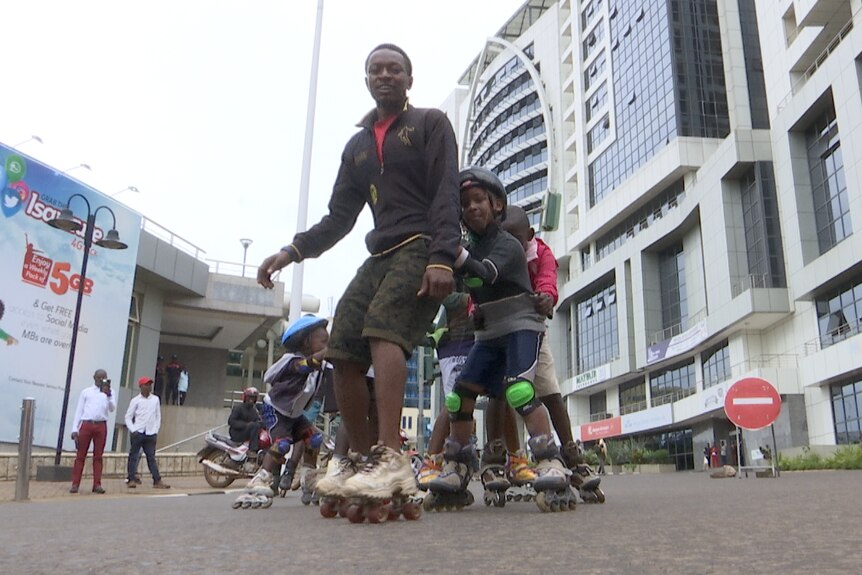 Young people roller skating in Kigali