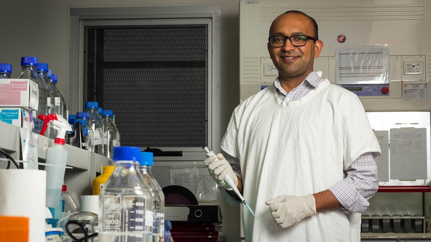 Dr Pradeep Tanwar stands in a laboratory.