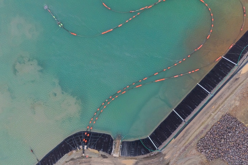 An aerial shot of a tailings dam.