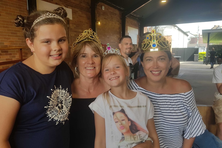 A group of royal fans waiting to meet prince charles in Bundaberg