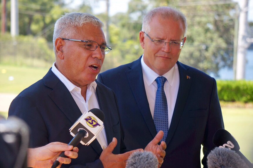 Warren Mundine (left) speaks with Scott Morrison (right) at a press conference on the New South Wales South Coast.