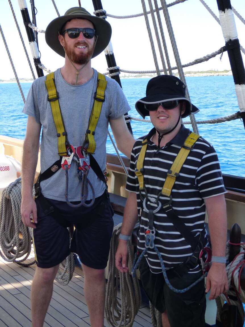 Greg Swalwell and Andrew Head geared-up to climb the mast.