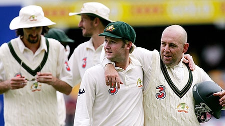 Michael Clarke leaves the field with Darren Lehmann