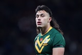 Australian Kangaroos' Tino Fa'asuamaleaui looks on during the Rugby League World Cup final.