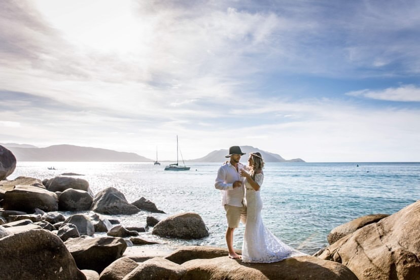 couple standing on a beach