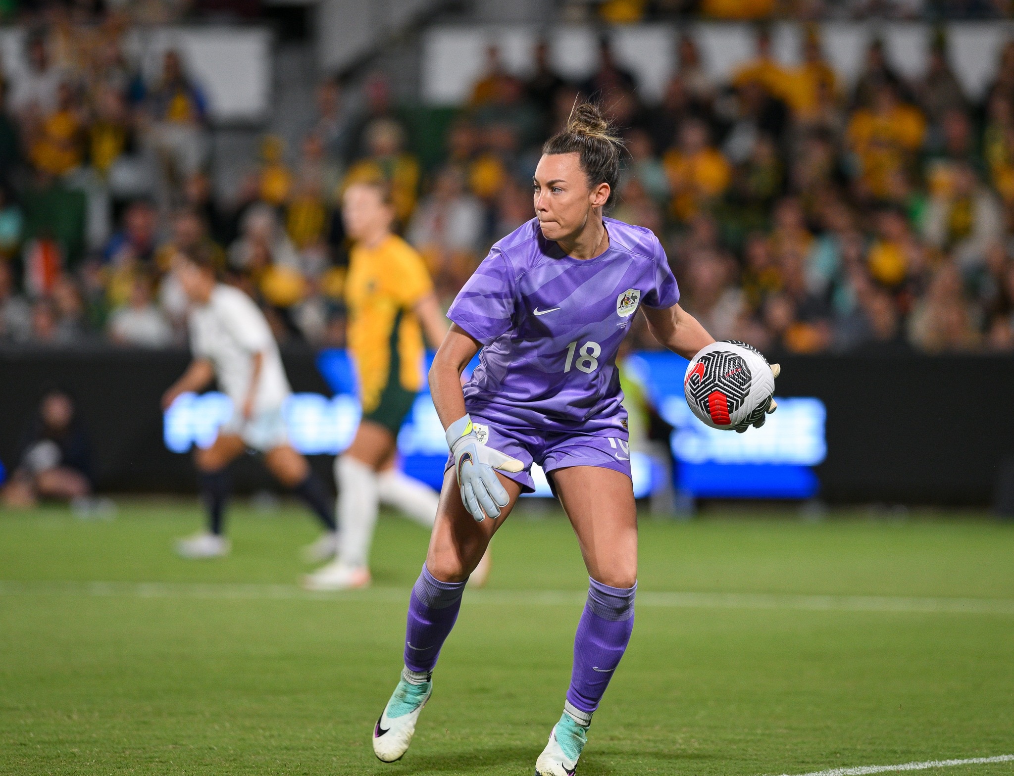 Matildas goalkeeper Mackenzie Arnold about to throw the ball out of goal square