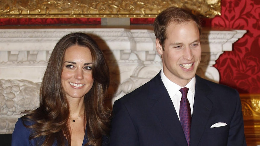 Britain's Prince William and his fiancee Kate Middleton