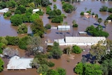 Aerial view of a town in flood.