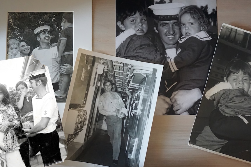 Black and white photos of darren as a baby hugging onto his dad who is wearing a navy uniform