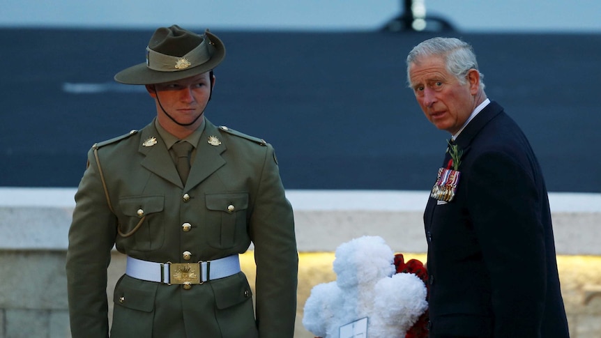 Prince Charles lays a wreath