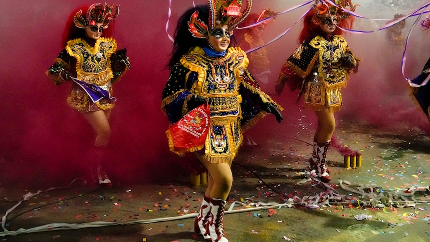 Woman dressed as the devil performs a traditional dance in Bolivia.