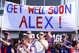 The 22-year-old forward Alex McKinnon is continuing to receive treatment for a broken neck.