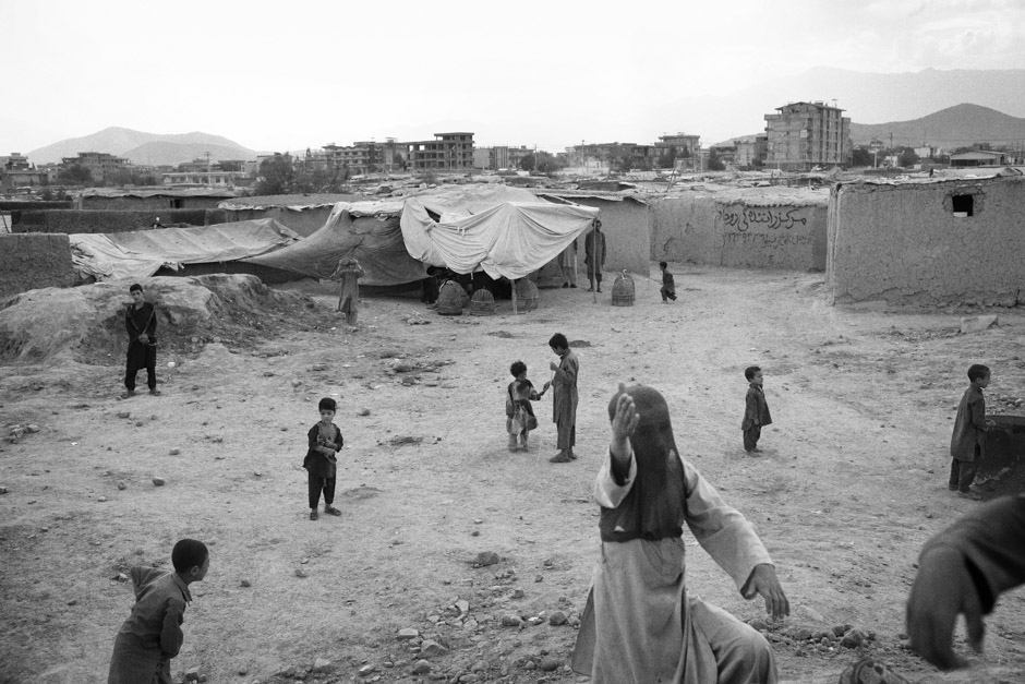 Children play in Charahi Qambar, one of the first camps for internally displaced Afghans that developed after 2001.