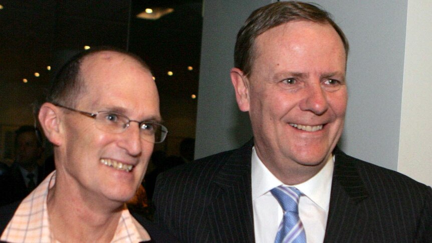 Philip Gaetjens and Peter Costello arrive at Parliament House