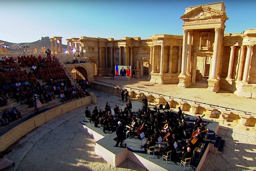 Russian musicians preparing to perform in an ancient theatre in Palmyra.