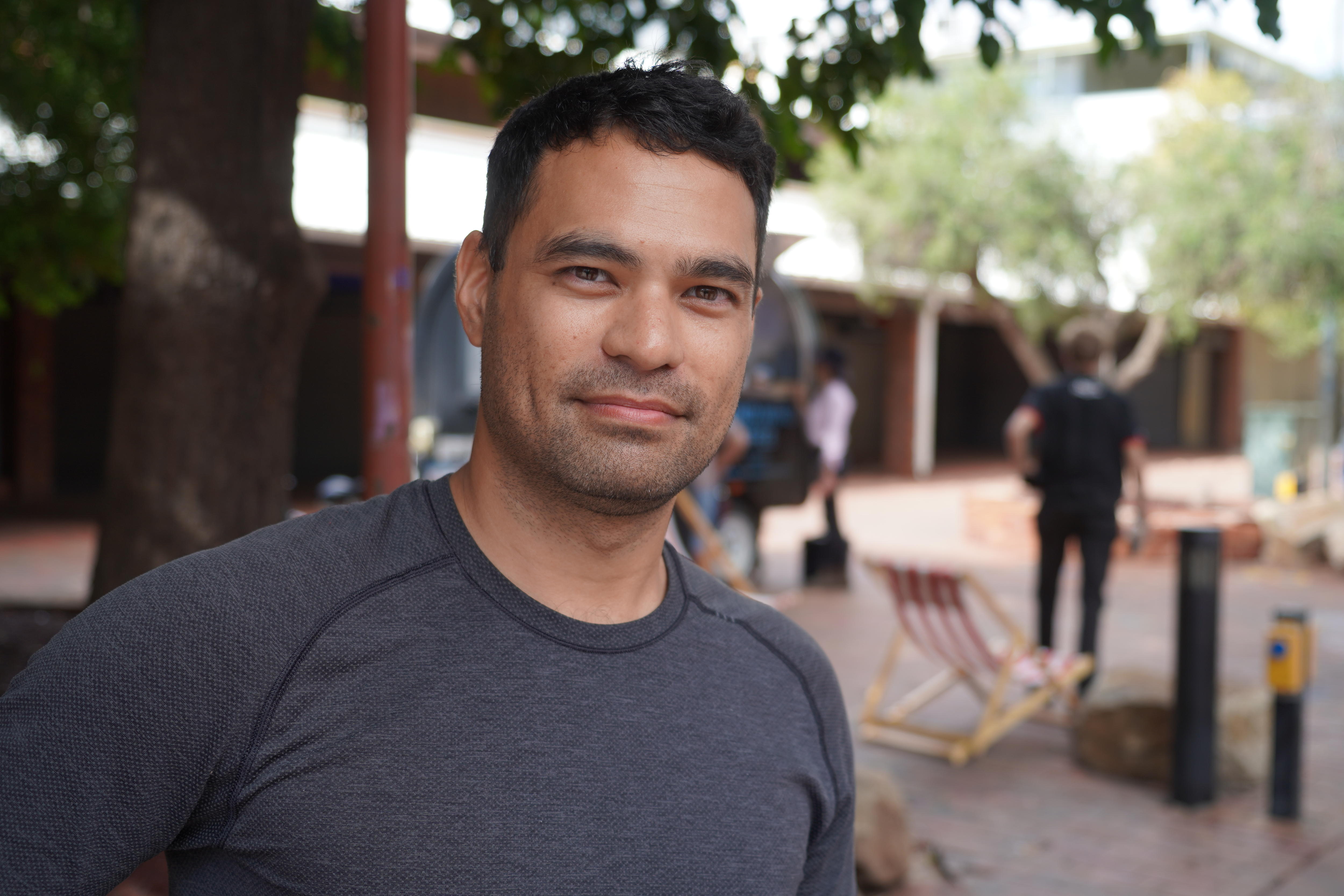 A man in a grey t shirt