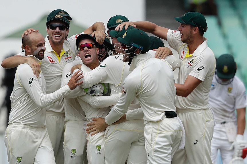 David Warner gives a spray