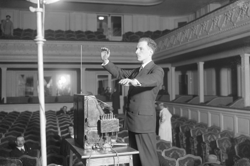 Leon Theremin playing the theremin in Paris