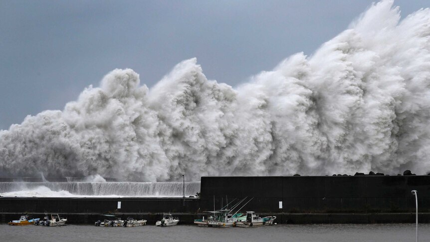 High waves caused by Typhoon Jebi hit breakwaters at a port of Aki, Kochi prefecture.
