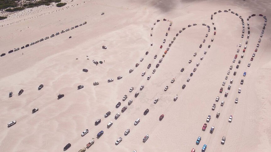 An aerial view of the convoy of more than 400 cars.