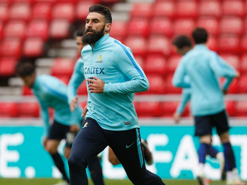 Socceroos captain Mile Jedinak training on May 26, 2016 ahead of a game against England.