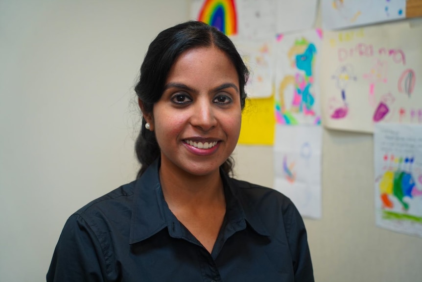 Mid-shot of Dr Ramya Raman smiling at the camera 