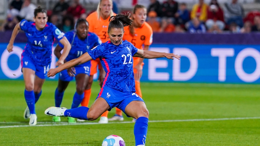 Eve Perisset scores from a penalty for France against the Netherlands at the European Championship