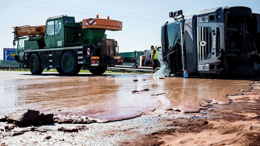 Tons of liquid milk chocolate are spilled and block six lanes on a highway