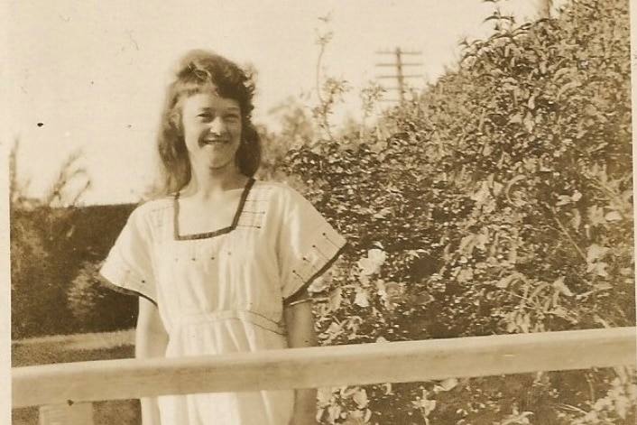A sepia coloured image of a woman from the 1930s or 1940s