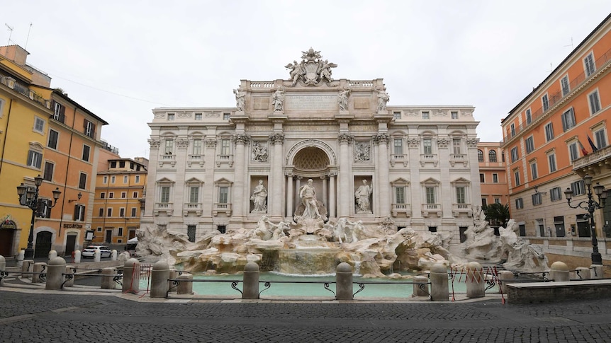 The area surrounding Italy's famous Di Trevi fountain lies bare.