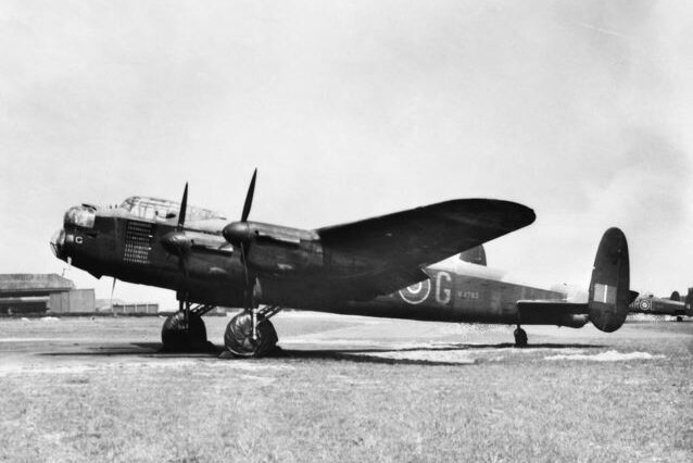 The Avro Lancaster B1, known as G for George, at an airstrip.