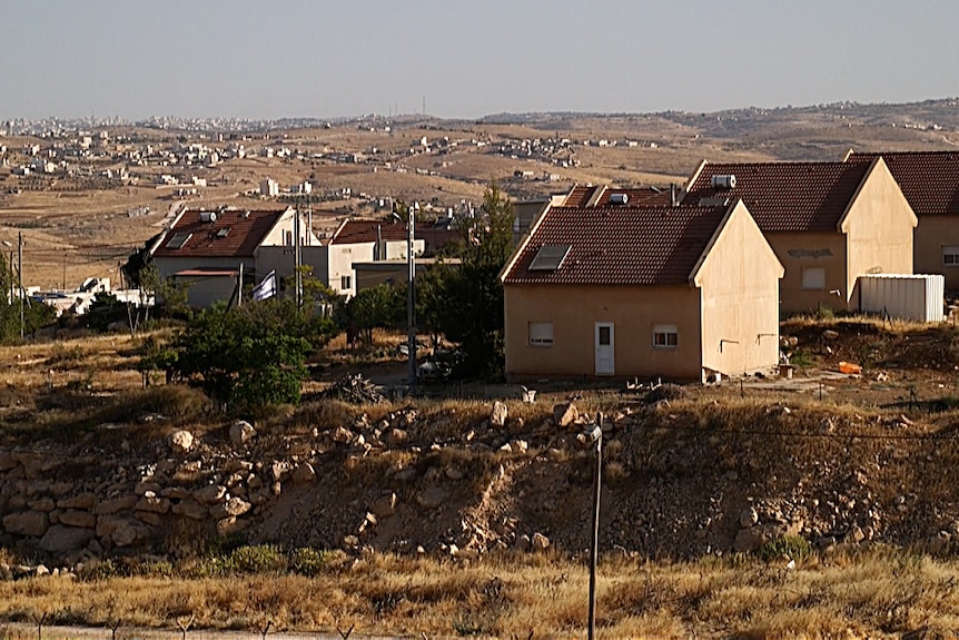 Homes in the village of Tuba and the Israeli settlement of Ma'on.