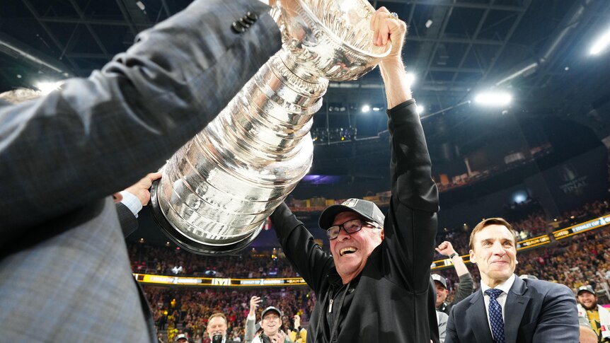 Las Vegas Knights owner Bill Foley lifts the Stanley Cup after his team won the NHL Finals.