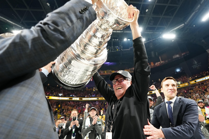 Las Vegas Knights owner Bill Foley lifts the Stanley Cup after his team won the NHL Finals.