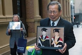 Newsagent Norman Lin's father, Yang Fei Lin outside Sydney's Supreme Court
