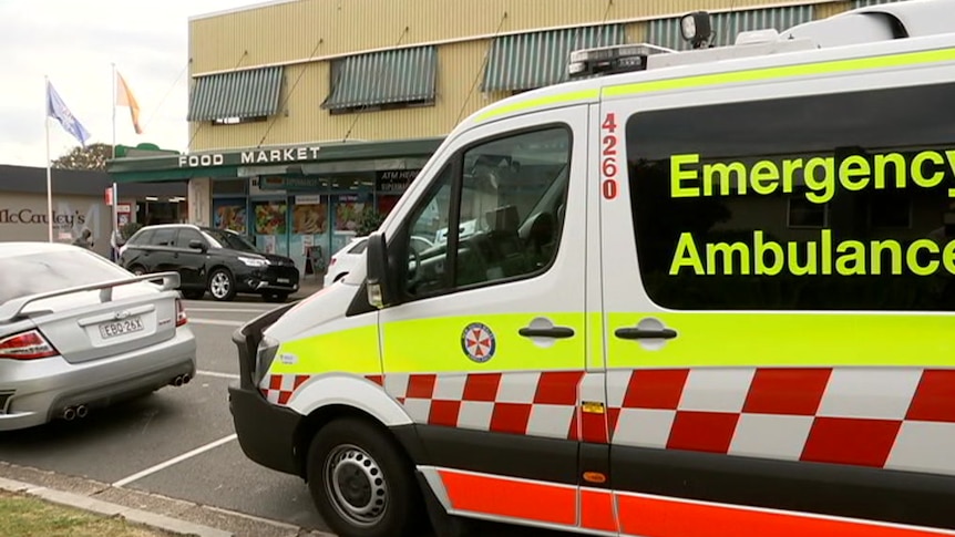ambulance outside a supermarket