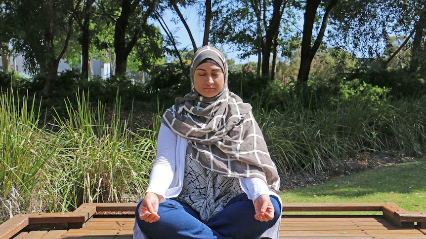 Suraya Sara meditating.