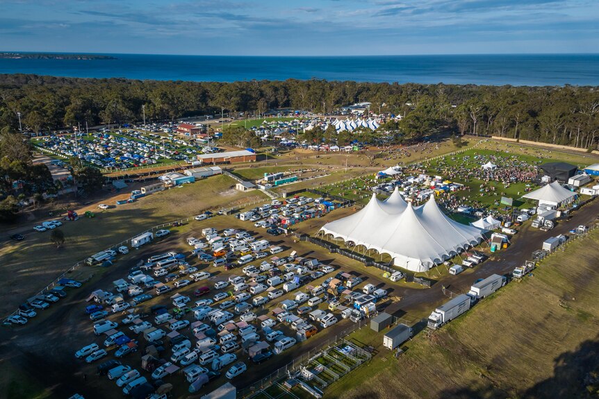 a drone shot of a festival