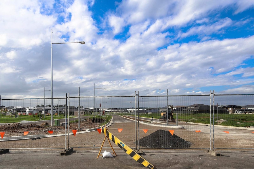 wide shot with open construction and housing