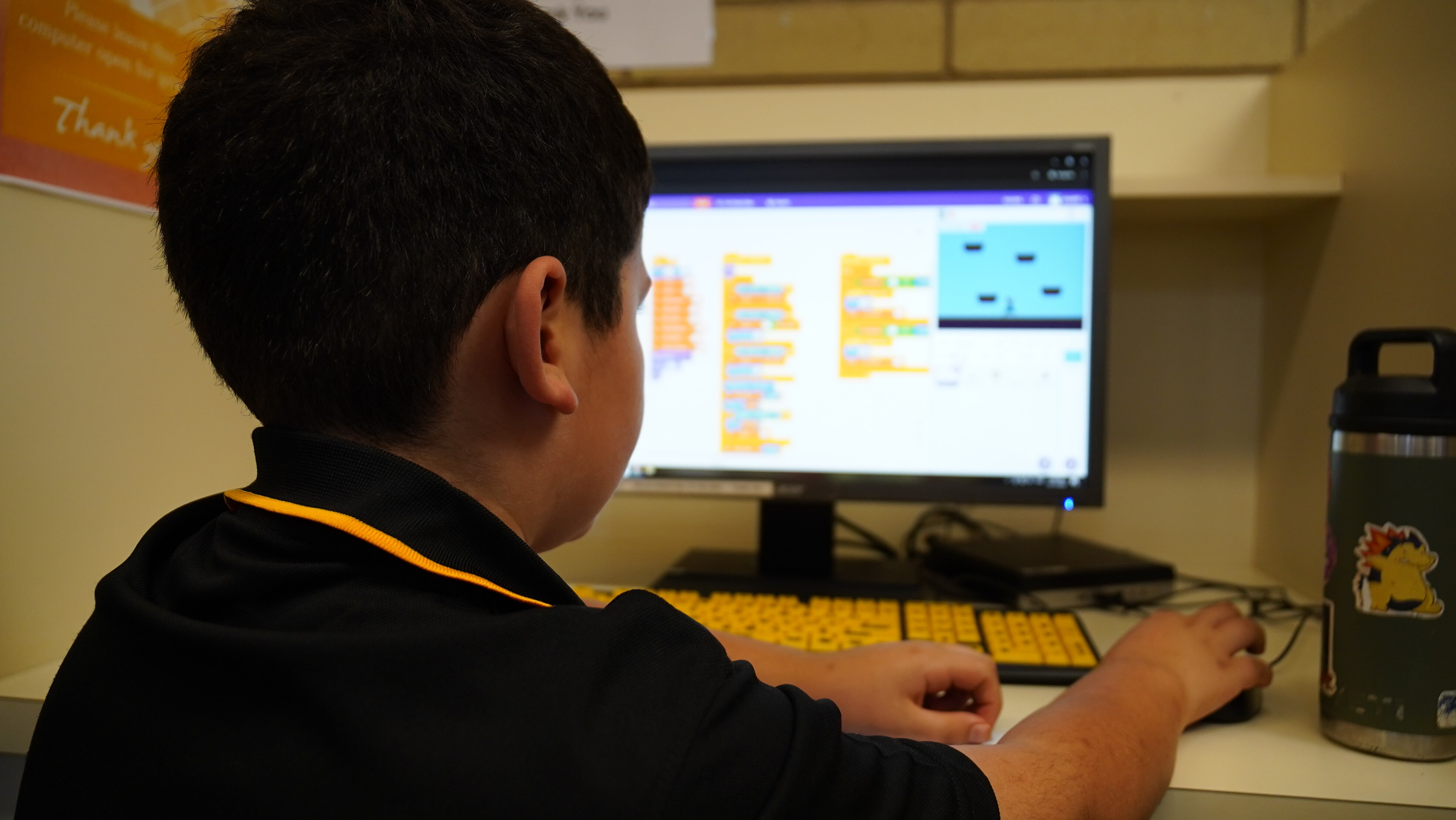 Students developing their own video games through the program.